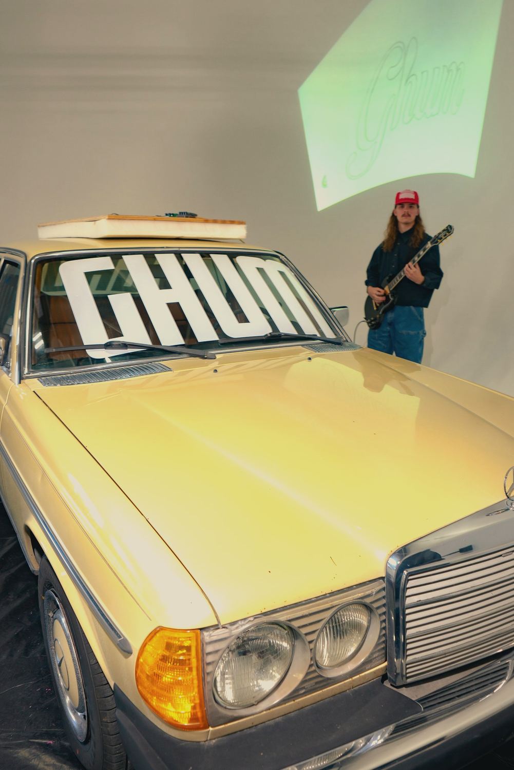 The GHUM Mercedes at Dinner and a Show, the wordmark across its windshield