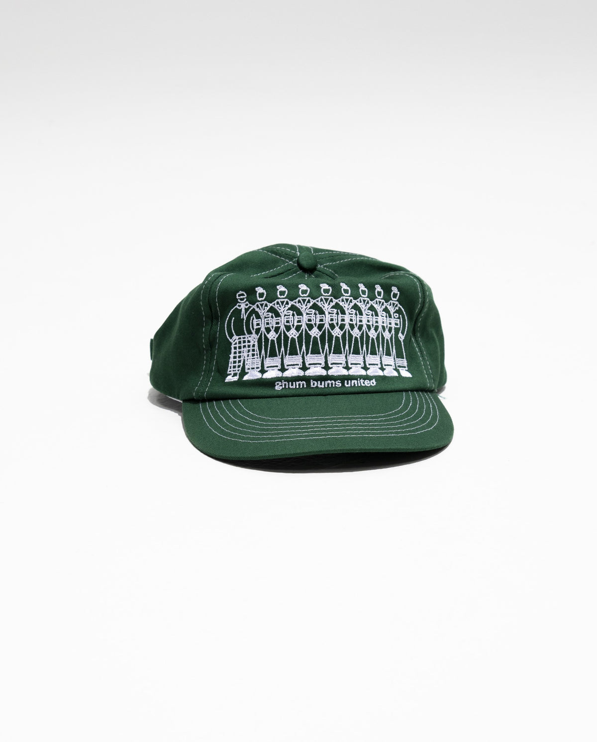 Green cap angled to show the printed crew across the front panel